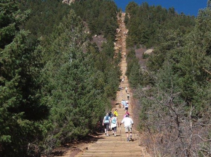 Hikers scale the Manitou Incline.