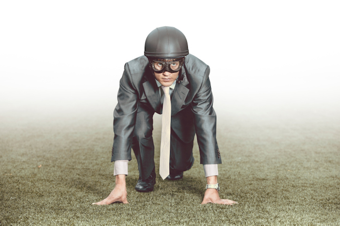 Businessman in the starting position