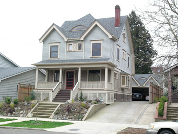 The three-story house in Portland was successfully moved to its new lot.