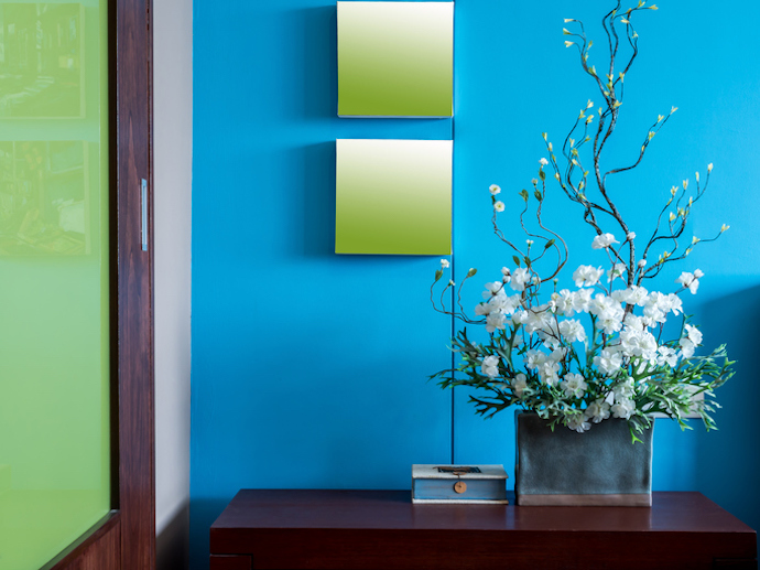 Colourful modern interior wall decorate with artificial flowers