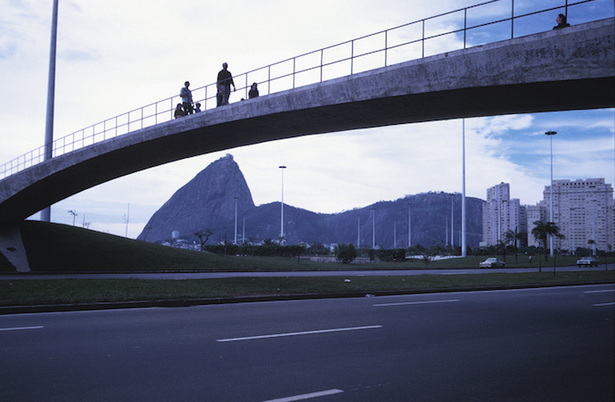 Pedestrians crossing footbridge in Rio de Janeiro, Brazil