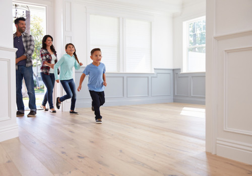 Hispanic Family Viewing Potential New Home