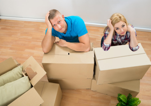 Young Couple With Cardboard Boxes