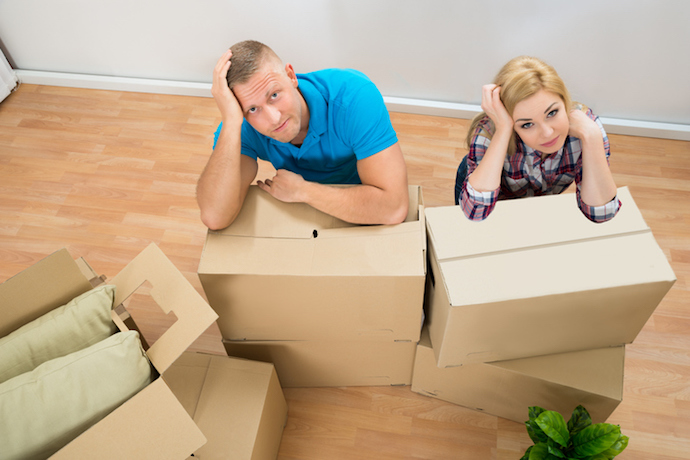 Young Couple With Cardboard Boxes