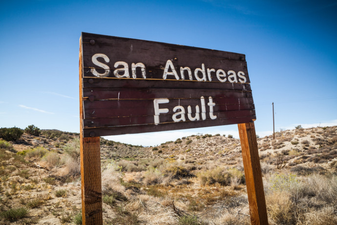 A sign posted where the San Andreas Fault intersects with Pallet Creek Road in Pearblossom California.