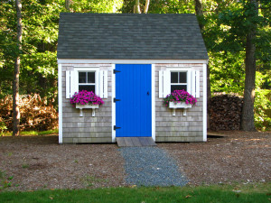 Backyard shed with blue door