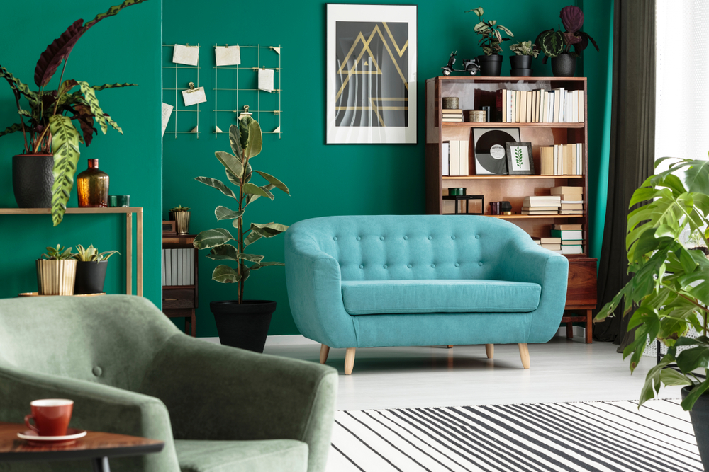 living room with bright turquoise wall paint