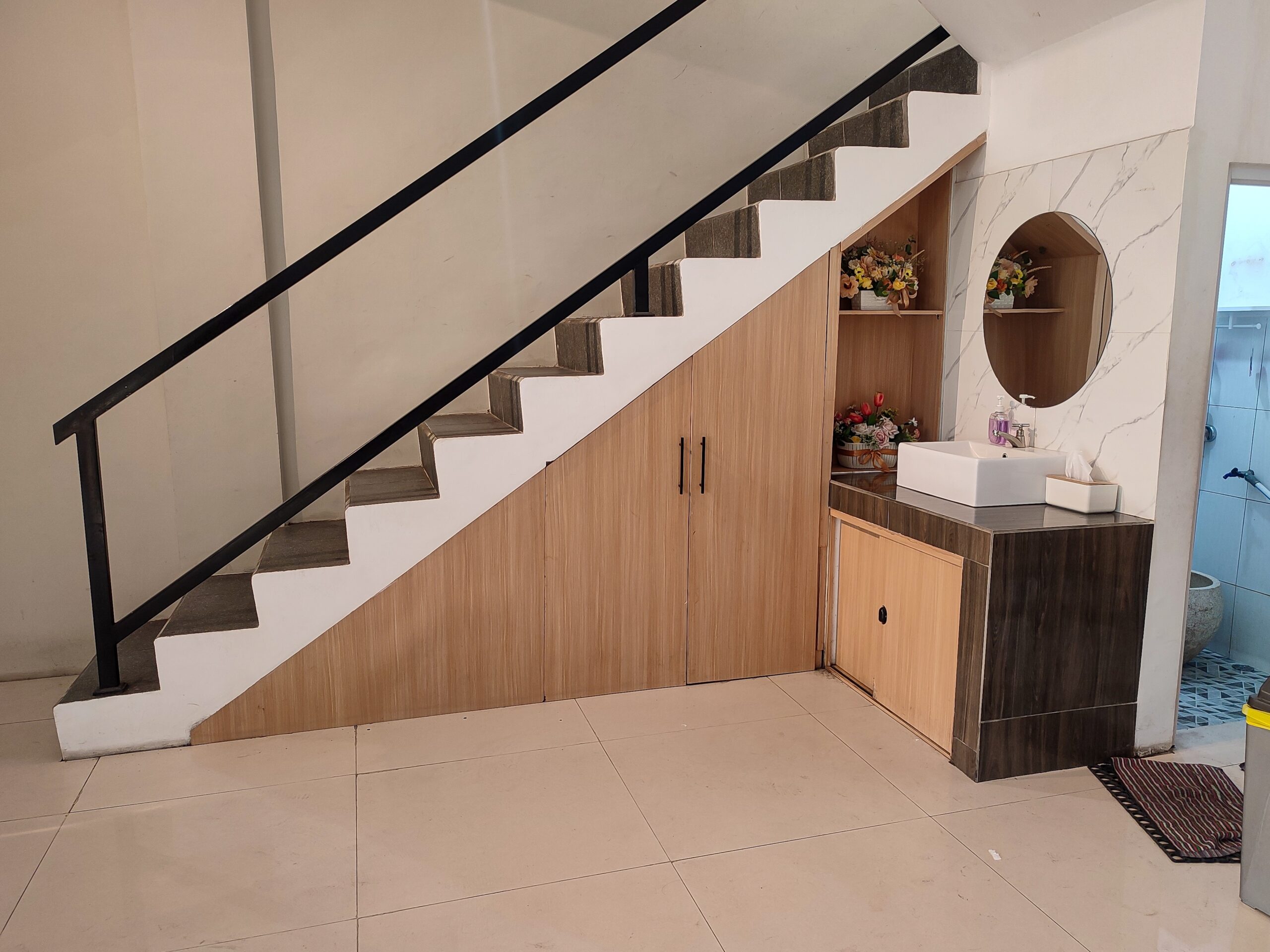 Image of additional storage under the stairs