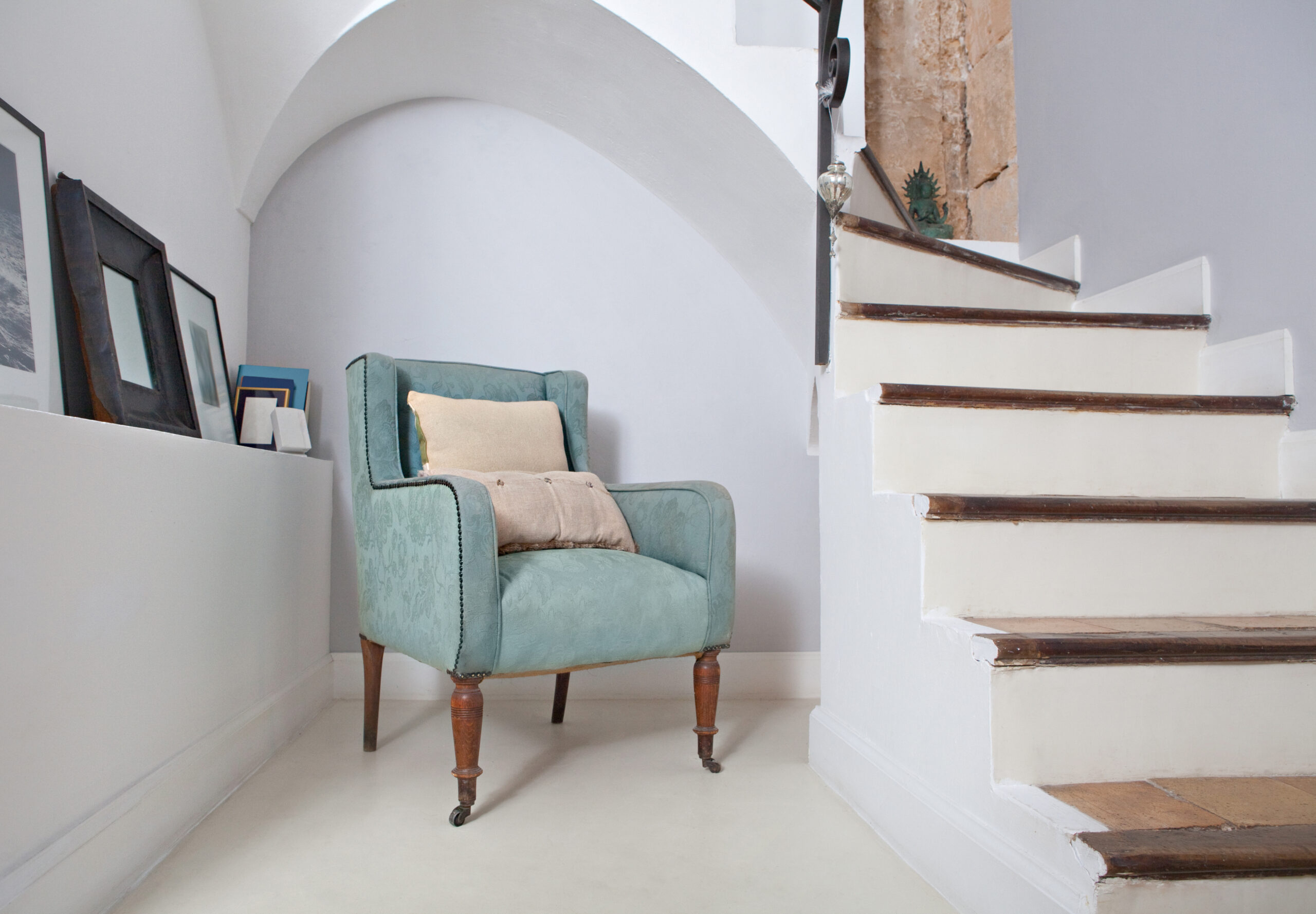 Image of a reading nook under the stairs