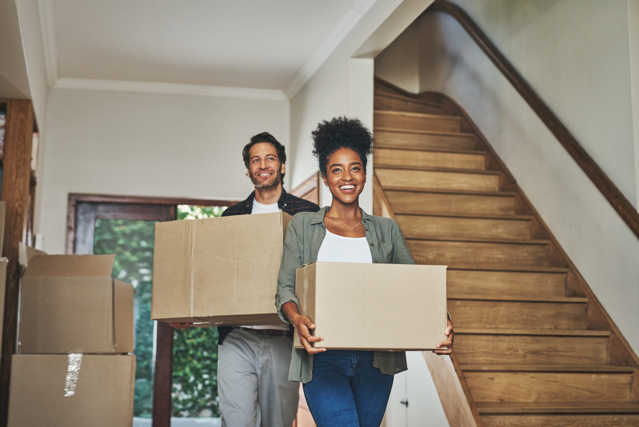 young couple moving in to a new home